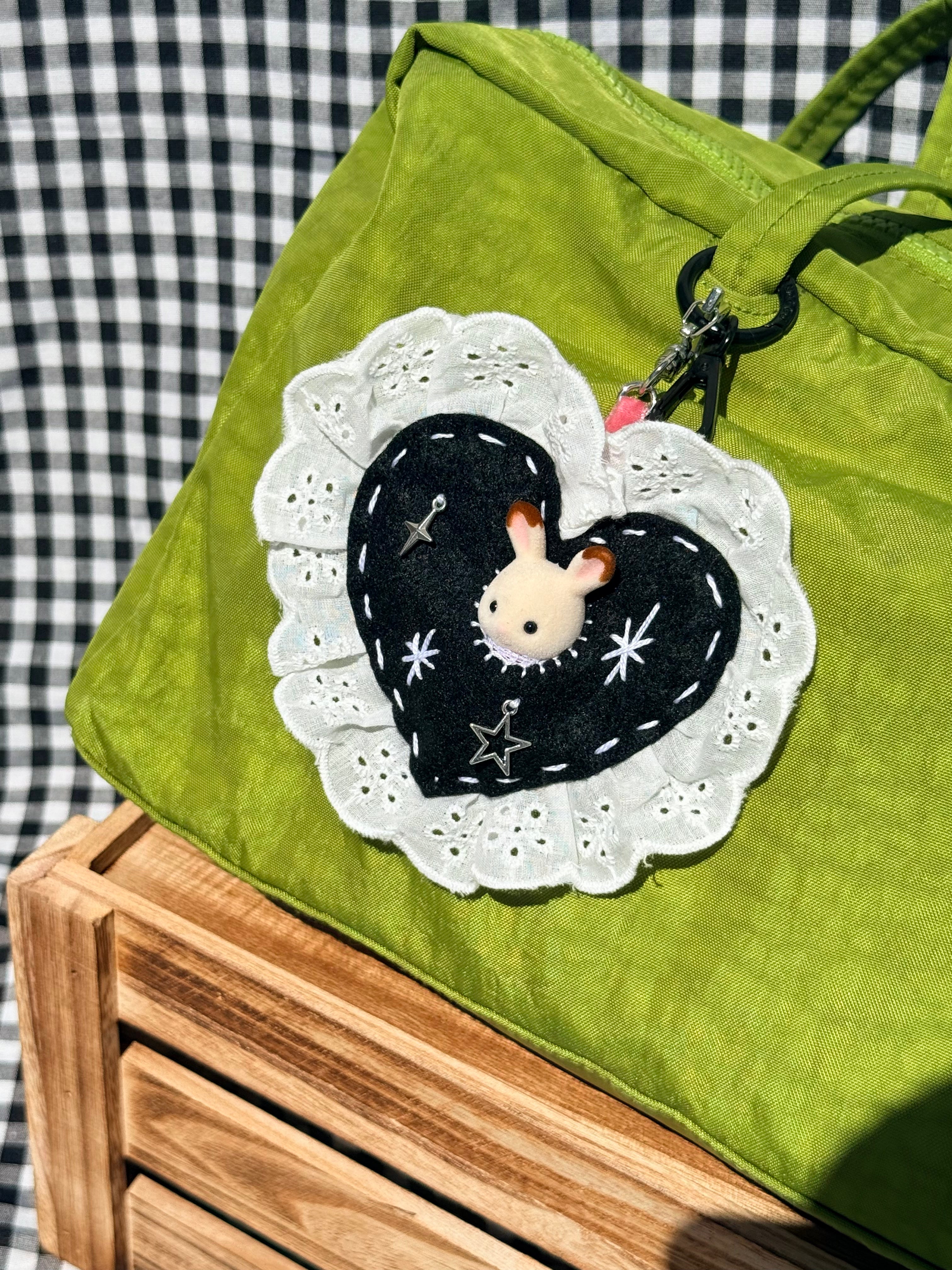 Black Felt Heart Eyelet Trim Lace Pouch with Surprise Figure